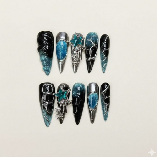 Starry Night - Galaxy blue and black nails with 3D planet charms.