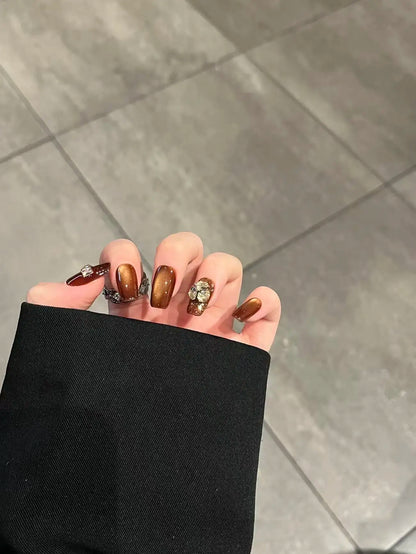 Amber Cat Eye - Detail shot on hand.