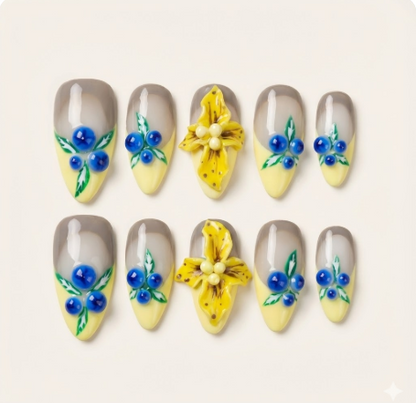 Lemon Berry - Yellow French nails with 3D blueberries and floral art.